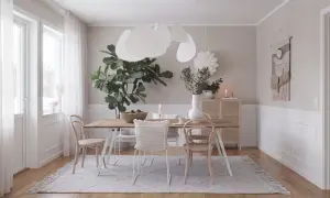 Helles, skandinavisches wohn esszimmer mit Holztisch, Stühlen, großer Zimmerpflanze und einem Rattan-Schrank.